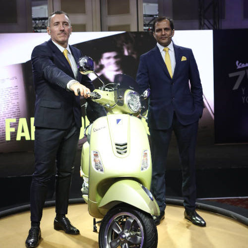 Graffi and Agrawal with Vespa, a lifestyle icon